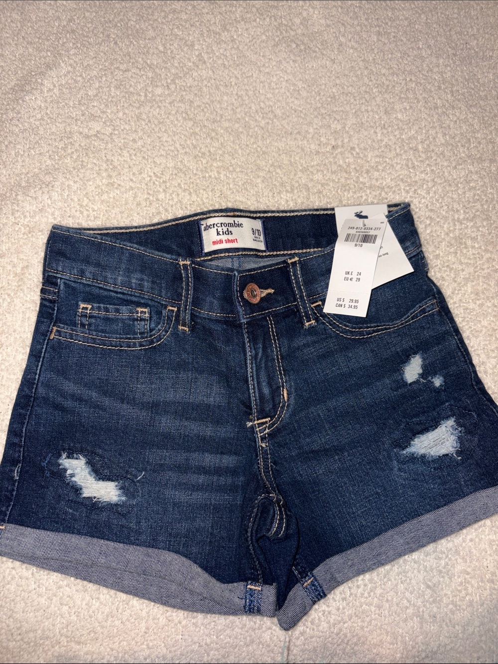 abercrombie kids dark blue distressed denim shorts